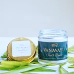 Vanavayu Oudh Twist soy wax candle in glass jar with gold lid