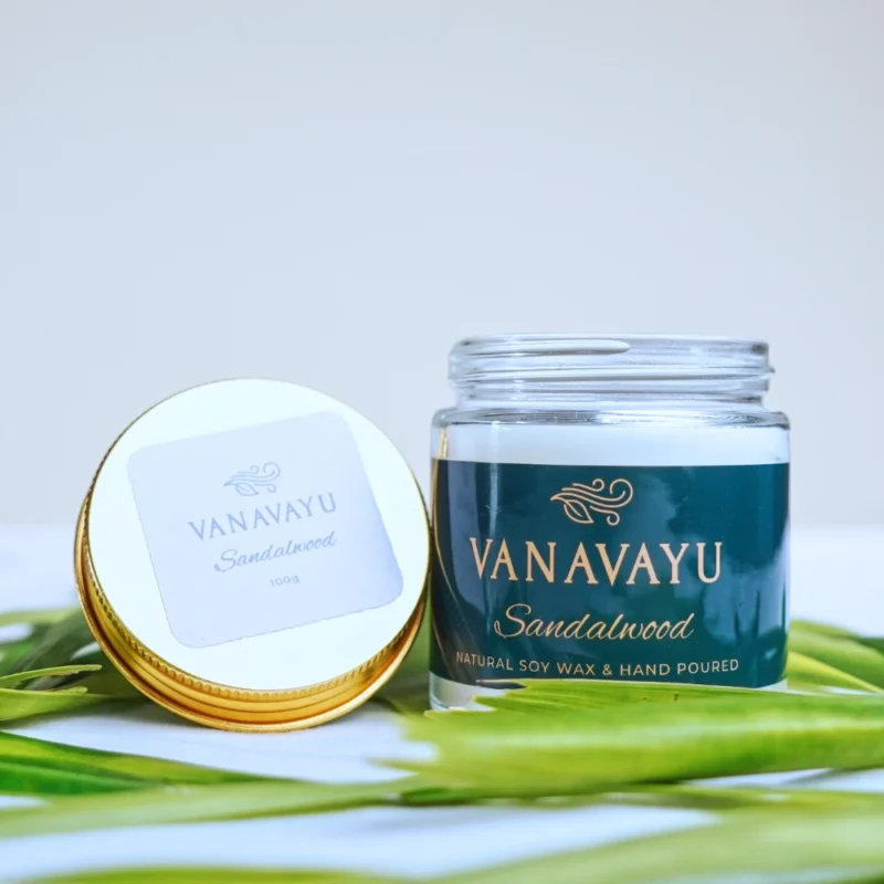 Vanavayu Sandalwood soy wax candle in glass jar with gold lid